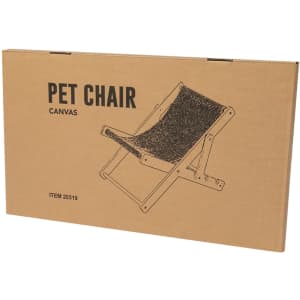A cardboard box containing a foldable pet chair with a canvas seat in black and grey shades. It features a logo.