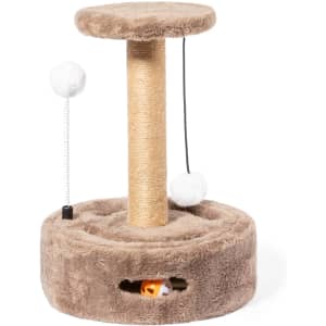 A plush, beige pet play tower featuring a scratching post, soft platform, and interactive toys.