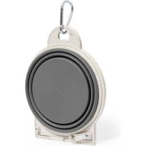 A foldable pet bowl in grey, with a beige holder and a carabiner for easy attachment. Features a logo on the design.