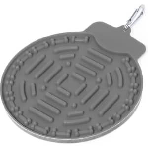 A grey Pudle Feeding Pillow with a textured surface, designed for pet feeding. Features a clip for attachment.