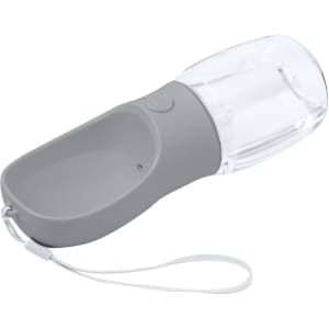 A drink bottle with a grey handle and a transparent top, featuring a loop for easy carrying.