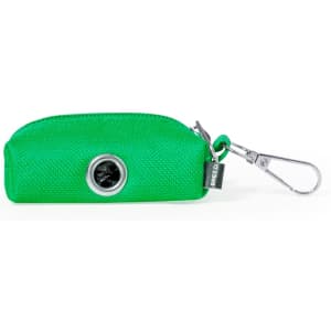 A green waste bag dispenser with a clip, featuring a circular opening and a branding label.
