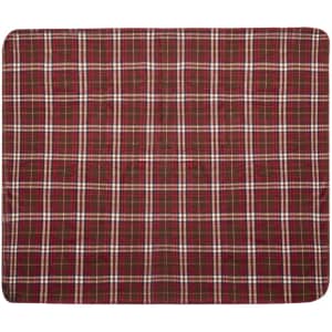 A red and brown plaid blanket featuring a checkered pattern and a smooth texture. The blanket has branding.