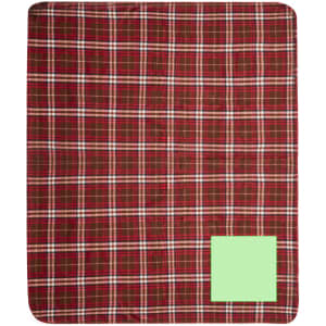 A red and green tartan blanket with a solid green corner. It features a plaid pattern throughout.