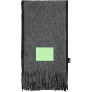 A grey scarf with fringed edges and a contrasting black border, featuring a logo.