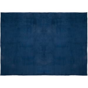 A textured navy blue blanket with a subtle design, suitable for home décor. Featuring a logo in one corner.