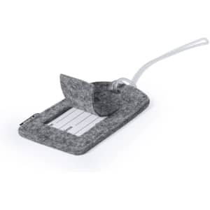 A grey felt luggage tag with a transparent sleeve for personal information and a securing strap.