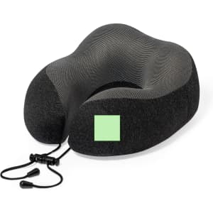 A black and grey ergonomic pillow with a drawstring, featuring a square area in a lighter green.