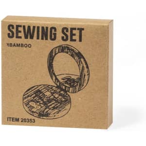 A sewing kit in a brown box featuring a bamboo design, containing various sewing accessories.