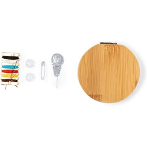 Atriax sewing kit featuring a bamboo case, thread spools, needles, safety pins, and a needle threader.