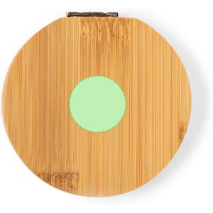 A round bamboo sewing kit with a green circular accent, featuring a metal clasp.
