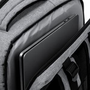 A grey Myriax backpack with a laptop partially visible in a padded compartment. It features a logo.