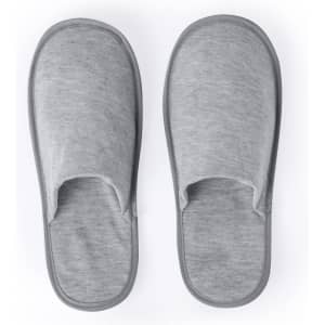A pair of grey fabric slippers with an open toe design and cushioned footbed.