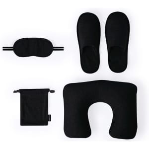 A black travel set featuring a neck pillow, sleep mask, slippers, and a storage pouch. All items are coordinated in colour.
