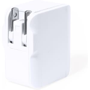 A white travel adapter with a compact design, featuring slots for plug connections and an internal locking mechanism.