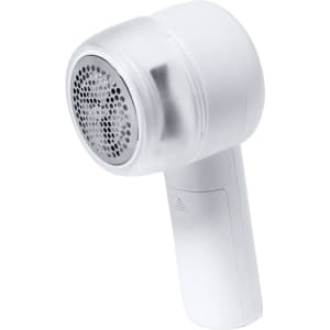 A white lint remover featuring a round head with a mesh surface and a contoured handle. It has a logo on the side.