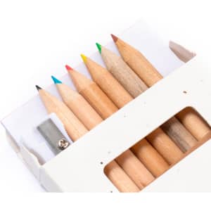 A set of coloured pencils featuring red, yellow, green, blue, and other shades, presented in a white box with a sharpener.