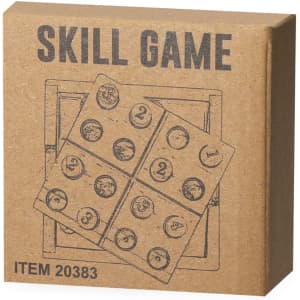 A brown cardboard box containing the "Crested Skill Game," featuring a grid design with numbered circles.