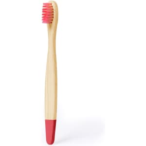 A bamboo toothbrush with a pink head and red handle, featuring a simple design and a logo.