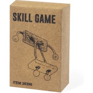 A brown cardboard box containing a skill game with attachment points and two balls. It has a logo on the front.