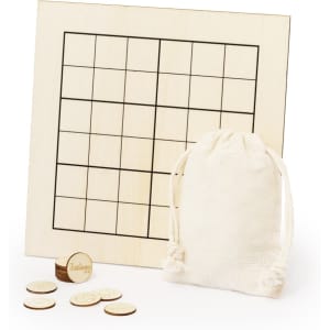 A wooden Sudoku board, a small cloth bag, and circular game pieces in natural colours.