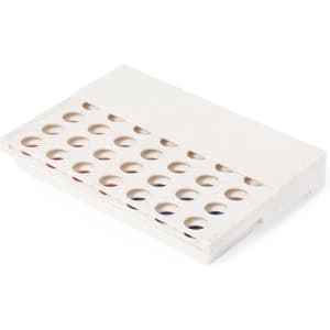 A white game box featuring multiple circular compartments designed for playing the Cissex Game.