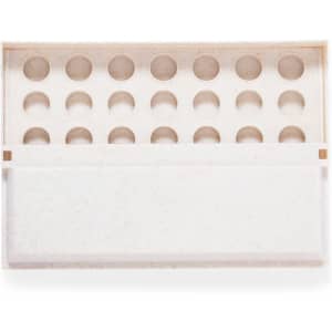 A white game box with 16 circular indentations on the top and a flat base, featuring a decorative design.