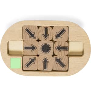 A wooden puzzle featuring nine blocks with directional arrows and a central circle, in natural wood tones with a green base.