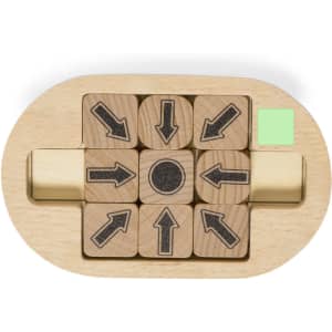 A wooden mini puzzle featuring directional arrows on six blocks and a central circular piece, set in a rectangular base.