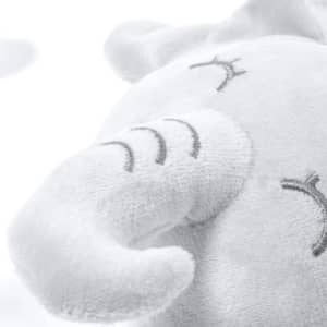 A plush elephant toy in soft white fabric with embroidered facial features, featuring a curled trunk.