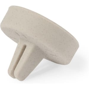 A beige air freshener product with a flat base and a dual-prong design, featuring a simple logo.