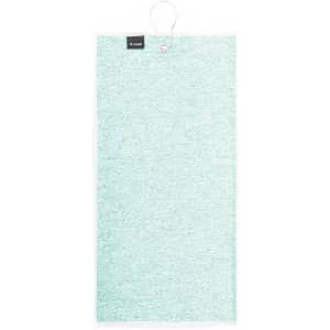 A light green golf towel with a loop for hanging and a branding tag at the top.
