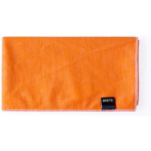 An orange cooling towel displayed flat, featuring a logo tag on one edge.