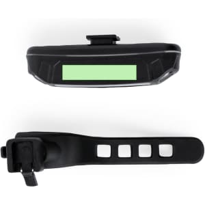 A black bike safety light with a green segment and an adjustable mounting strap. It features a logo on the surface.
