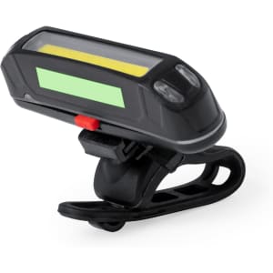A black bike safety light with a green and yellow display, featuring a clip for attachment.