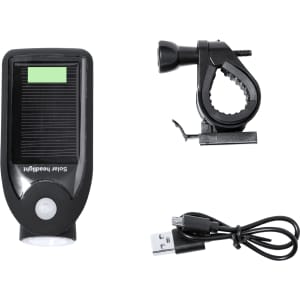 A black bike safety light with a solar panel, mount, and USB charging cable. Includes a clip for attachment.