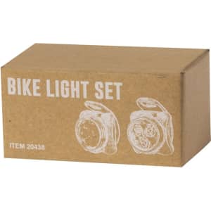 A brown cardboard box containing a bike light set with a simple line drawing of the lights on the front.