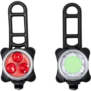 A set of black bike safety lights featuring three red LEDs on one side and a white light on the other. Each light includes a mount.