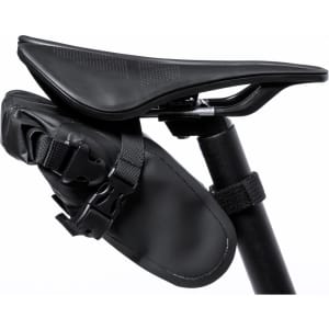 A black bike bag is attached to a bicycle saddle, featuring a secure strap and sleek design.
