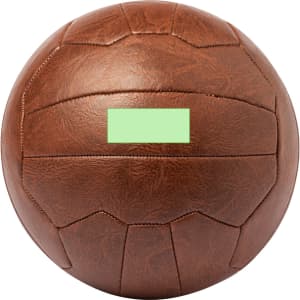 A brown sports ball with a textured surface, featuring a logo and a rectangular green label.
