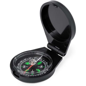 A black compass with a clear cover, featuring a marked directional dial and a logo on the side.