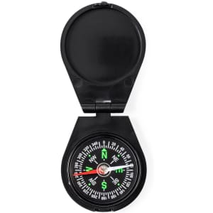 A black compass with a foldable design, featuring a clear dial with directional indicators in green and white.