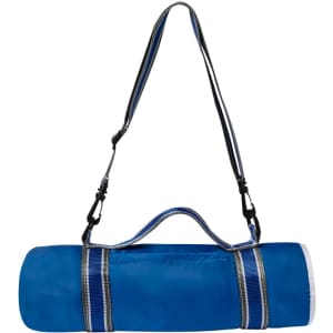 A blue picnic blanket with a carry strap, featuring grey and white accents, ready for outdoor use.