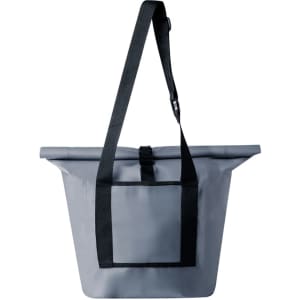 A grey dry bag with a strap and a front pocket, featuring a logo on the surface.