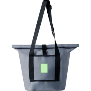 A grey dry bag with a black strap and a green square logo on the front.