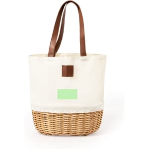 A cream and wicker picnic basket with brown leather handles and a plain area for branding.