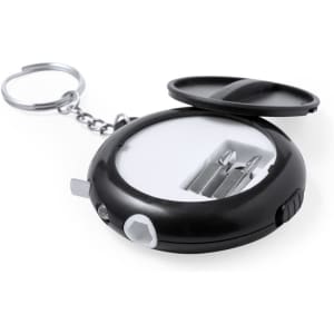 A black multitool tape measure with a keyring, featuring various tool attachments inside.