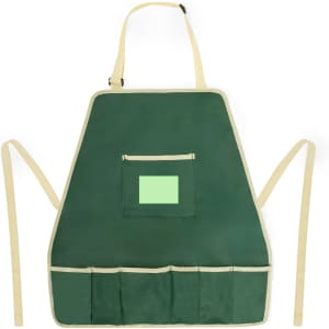 A green gardening apron with beige straps and pockets, featuring a logo on the front.