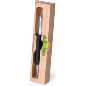 A multitool in a bamboo box, featuring a pen, level, and ruler. The pen has a silver and black design.