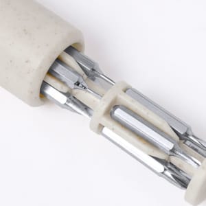 A multitool featuring multiple silver metal attachments and a textured cream-coloured handle, with a branding logo present.